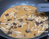 A picture of step 7 of Braised Mushrooms and Tofu.