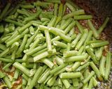 A picture of step 5 of Barbati Masala Curry.