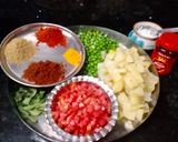 A picture of step 2 of Masala laccha paratha with aloo matar in tomato gravy.