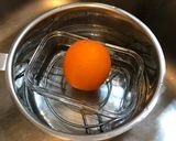 A picture of step 3 of Double-boiled orange.