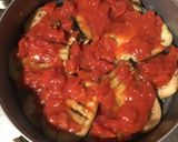 Une image de l'étape 5 de Aubergines grillées façon gâteau aux tomates, farce au chapon, pesto et emmental.