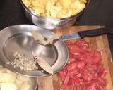 A picture of step 1 of Gobhi sabzi with rice.