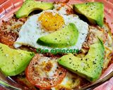 Foto del paso 5 de la receta: Cazuelita con calabacín, tomate, huevo y muchos extras 😋