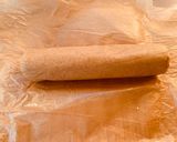 Foto del passaggio 4 della ricetta Rotolo di Pandoro con crema di Speculoos e Granella di Nocciole