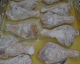 A picture of step 3 of Baked Bisquick Crunchy Drumsticks.