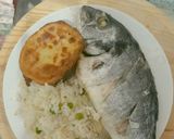 Foto del paso 6 de la receta: Dorada al horno empapelado acompañado con papas y arroz