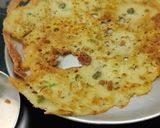 A picture of step 2 of Onion Rava Dosa with nariyal chutney, sambar.