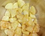A picture of step 3 of Cheesey Spicy Garlic Potato.