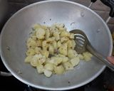 A picture of step 6 of Utter Pradesh Hing jeera aloo.