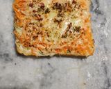 A picture of step 6 of Carrot toast with cheese spread.