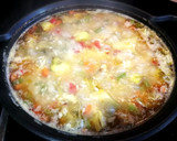 Foto del paso 6 de la receta: Arroz Nomen con alas de pollo, bimi y alcachofas