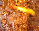 A picture of step 12 of Odia style mutton curry.