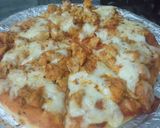 A picture of step 5 of Chéésy cheese 🧀 chicken 🐔 pizza 🍕🍕.