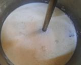 A picture of step 5 of Nolen gurer payesh or Rice kheer with date palm jaggery.