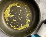 A picture of step 1 of Tomato onion eggs.