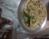 A picture of step 3 of Palak prontha with curd.