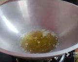 A picture of step 1 of Gajar Ka Halwa.