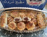 A picture of step 4 of Eid Maamoul with Cream Cheese.