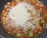 Foto del paso 2 de la receta: Arroz con pollo y calamares. Muy fácil