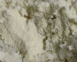 A picture of step 2 of Coconut ladoo.