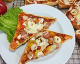 Foto langkah ke 5 dari resep Roti Pizza Seafood.