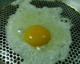 Foto del paso 4 de la receta: Arroz con salchichas y huevo