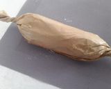 A picture of step 2 of Sig's Salami and Cream Cheese Roll.