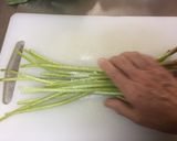 A picture of step 4 of Japanese Wild Grass (Fuki) Cooking.