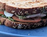 A picture of step 4 of Caprese sandwich with pesto.