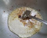 A picture of step 5 of Banana flowers dip in mustard seeds.