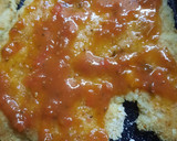 Foto del paso 2 de la receta: Milanesa a la napolitana con papas fritas y huevo