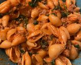 A picture of step 3 of Easy stuffed shells (pasta bake) spinach mushrooms and ricotta cheese.