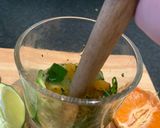 A picture of step 1 of Orange mint mojito.