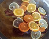 Foto del paso 4 de la receta: Chuletas de cerdo al cítrico
