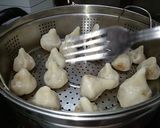 A picture of step 3 of Coconut Modak.