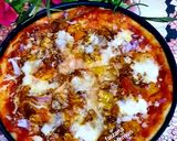 A picture of step 8 of Chicken tikka pizza.