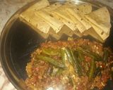 A picture of step 8 of Masala Bharwa Bhindi with Roti.