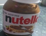 A picture of step 2 of Nutella banana milkshake.