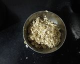 A picture of step 5 of Vegan banana nut muffins- with crunchy oat topping.