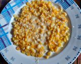 A picture of step 2 of Butter and Cheese corn pizza.