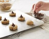 A picture of step 4 of Peanut Butter Blossoms.