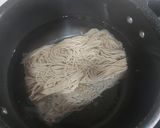 A picture of step 1 of American chopsuey with fried rice.