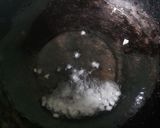A picture of step 2 of Fried Schezwan Chicken Momos.