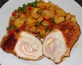 A picture of step 3 of Chicken Breast Stuffed with Ham and Cheese. Peas and Potatoes.