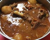 A picture of step 5 of Kesari Rice with chicken fry and mutton kosha.