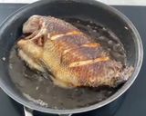 A picture of step 3 of Seasoned Glutinous Rice with Fried Tilapia.