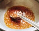 A picture of step 4 of Chickpea curry (chana masala curry).