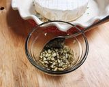 A picture of step 3 of Savory Garlic and Herb Baked Brie.