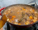 A picture of step 26 of Beef Bourguignon with Sweet Potato, Carrots, Turnips, and Mushrooms.