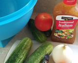 A picture of step 1 of Cucumber, Tomato, & Onion Salad.